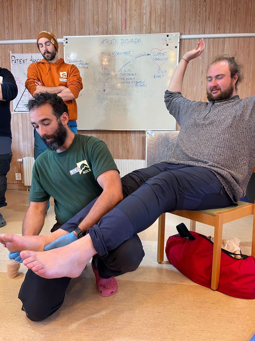 Ankle wrap practice NOLS Wilderness First Aid